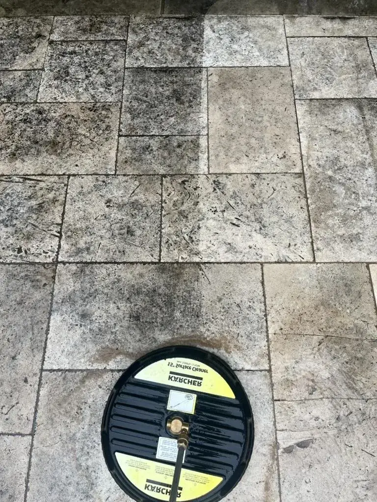 Commercial stone paver surface mid-cleaning showing before and after, Dallas-Fort Worth